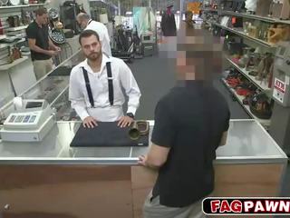 Dude blows a manhood behind counter in a shop